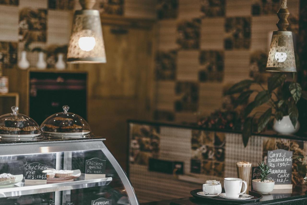 Готель The Panoramic Getaway Муннар Екстер'єр фото Interior of a coffee shop