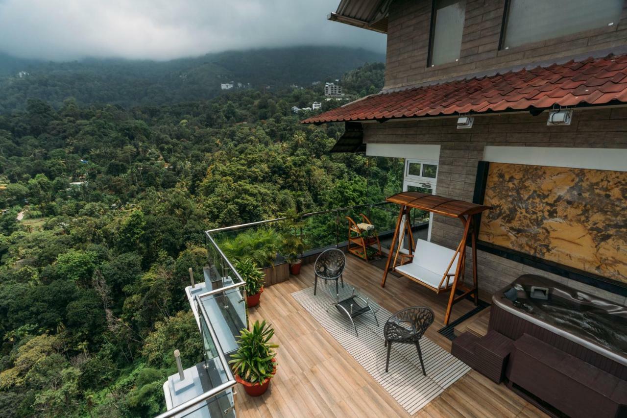 Готель The Panoramic Getaway Муннар Екстер'єр фото A view from the balcony of a house in Kerala, India